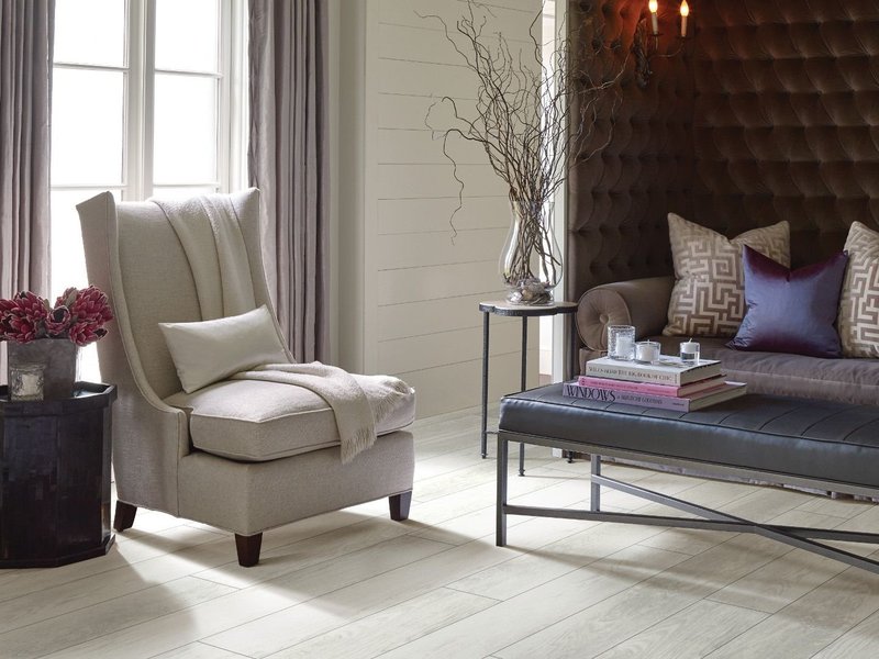 White armchair on laminate Laydwel Floors in Appleton